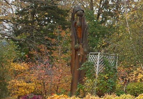 Sculpture (Carved Tree Stump?) in the Yard of 3503 Cedar Lake Ave.