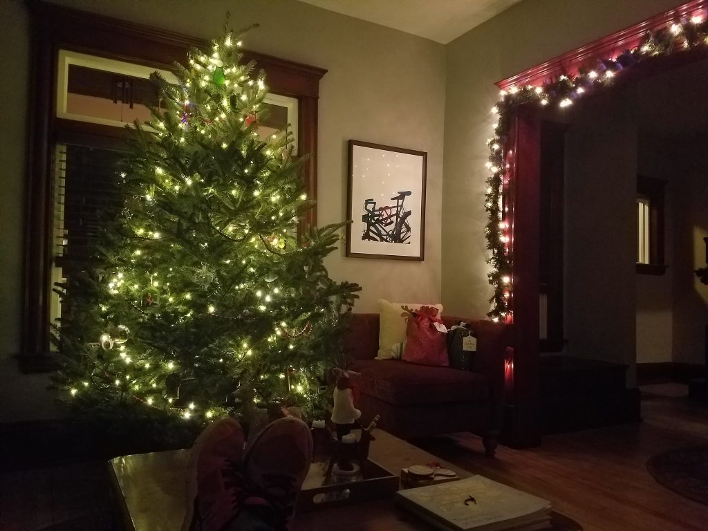 Christmas tree and garland in a living room