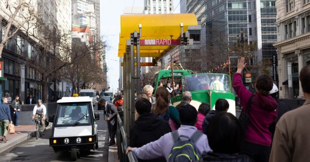 Riders greet one of San Francisco Muni's Boat Trams at Market and 4th in San Francisco on January 29, 2020. The Boat Tram, which operates on a limited basis, made a special appearance to commemorate the closure of lower Market Street to private automobiles. Photo: Henry Pan