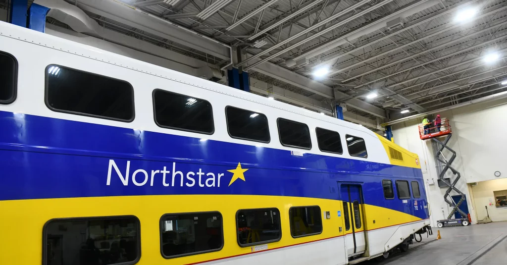 A blue, yellow and white train car says Northstar on the side, along with the image of a star.