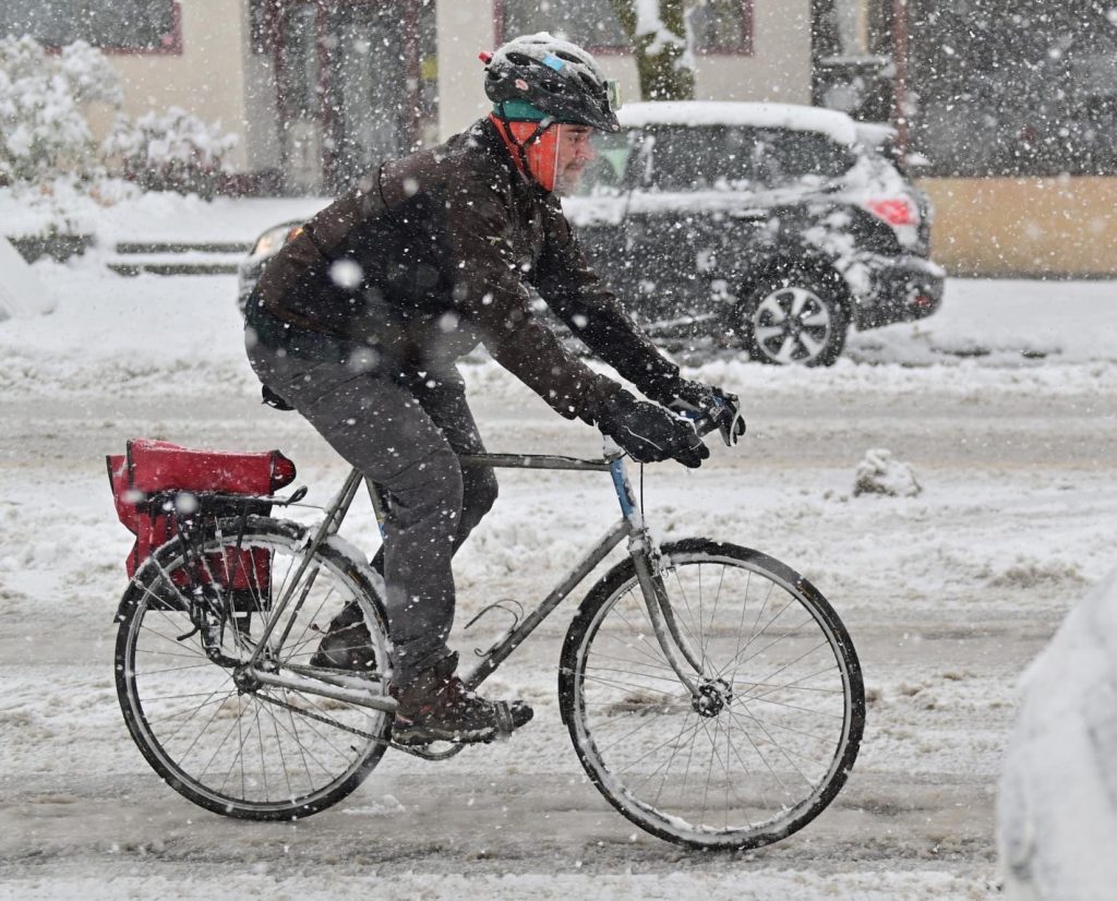 A Streets.mn contributor biking on Grand Avenue in Saint Paul on October 20, 2020. Photo by John Autey