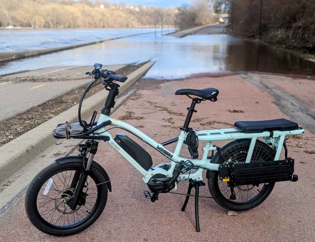 An empty cargo bike on the Mississippi River Road trail in the Twin Cities.