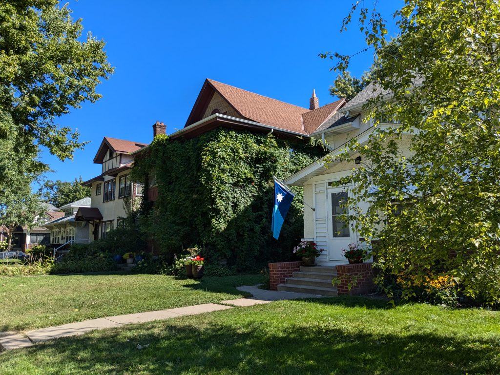 The Near North neighborhood in Minneapolis has leafy yards and well-tended homes, as shown on this block.
