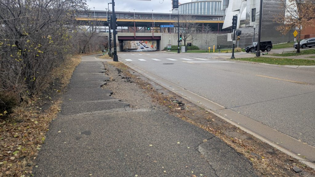 View of the Delaware St intersection from the south side. You can see the path breaking down at this point.