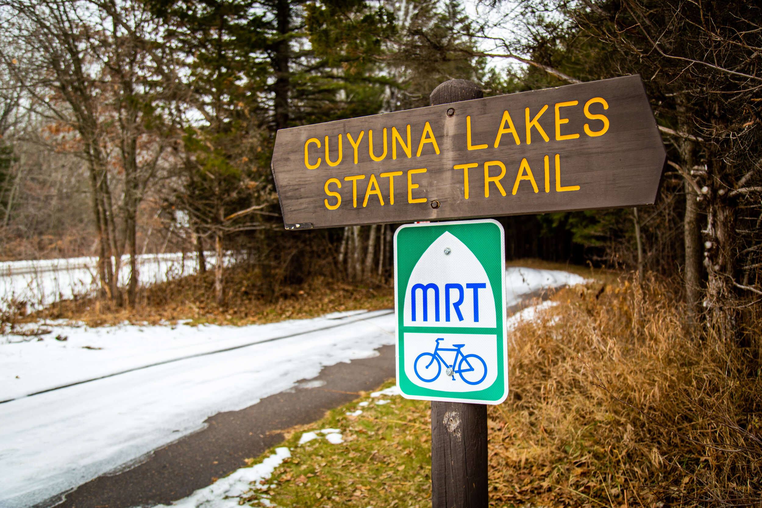 A signed entrance to the Cuyuna Lakes State Trail in Minnesota.