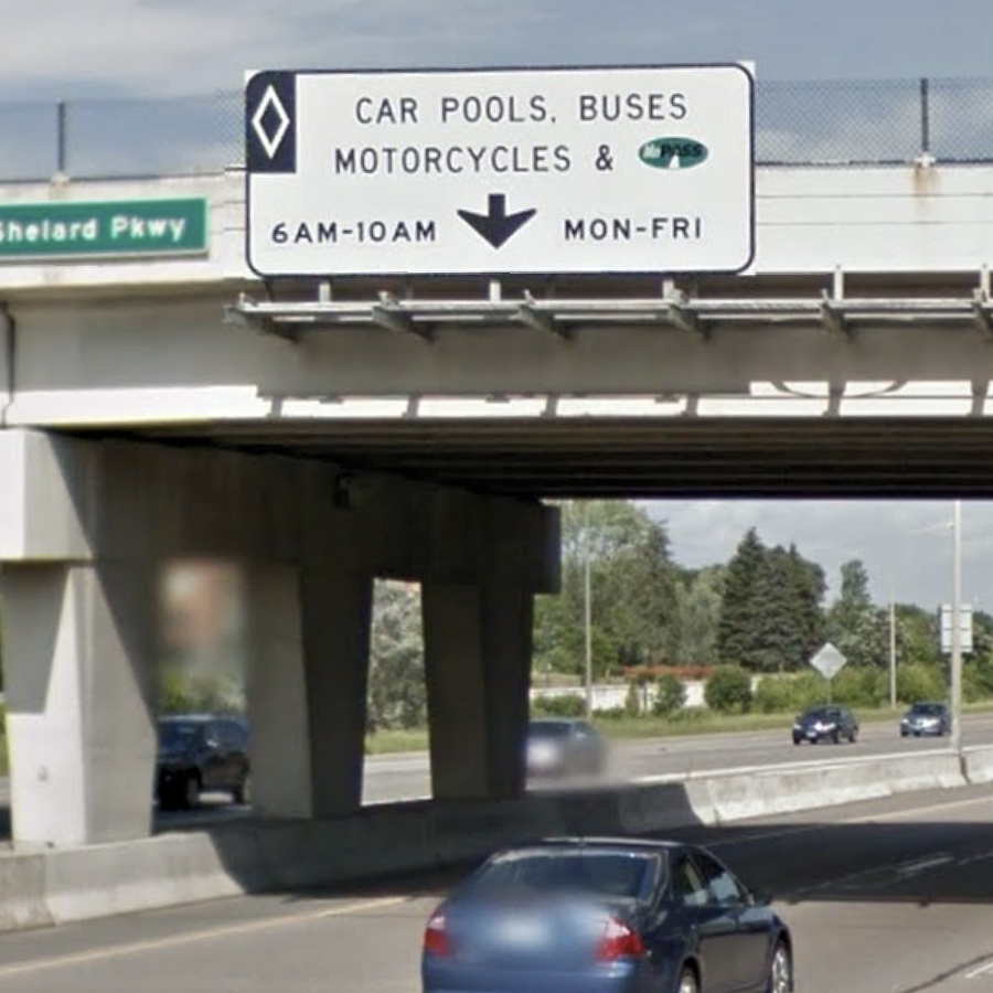 An older high-occupancy lane sign on I-394 in Minnesota. 