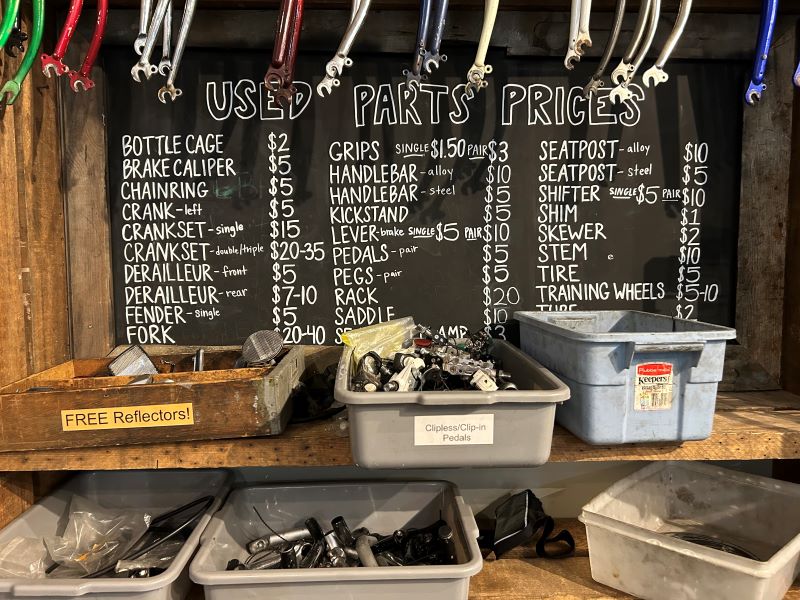 Recovery's used bike parts pricing sign