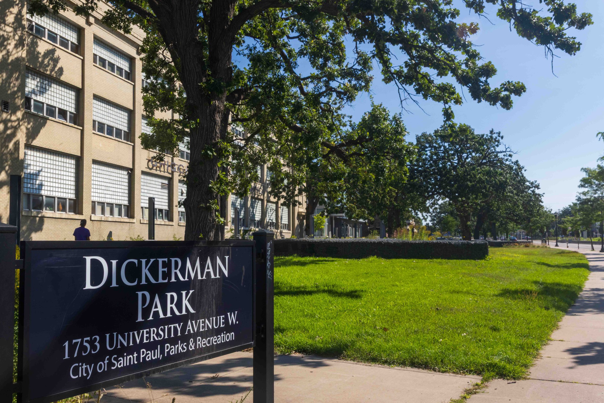 Dickerman Park sign and green area.