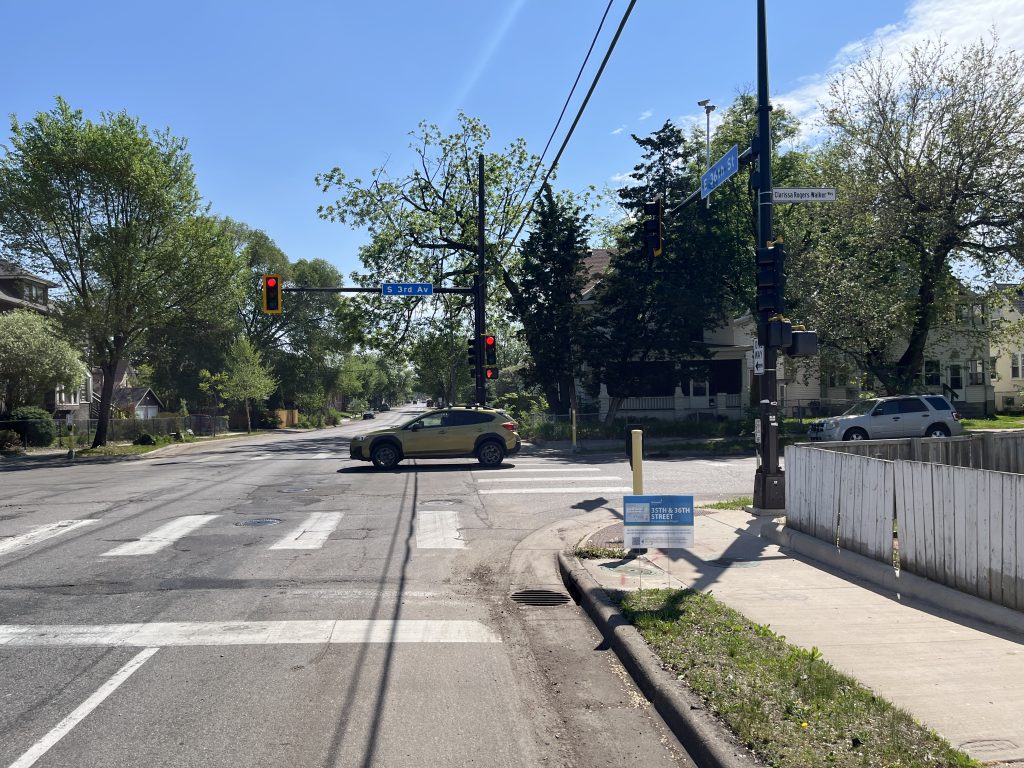 A car drives through an intersection in south Minneapolis.