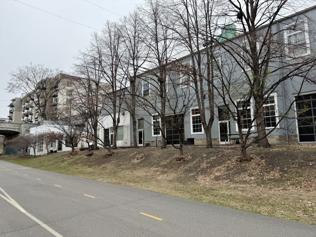 A repurposed industrial building sits between Aldrich and Lyndale avenues.