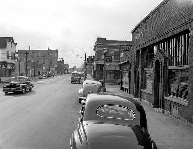 1948 picture of Arcade St. looking south from Case. Busy with cars.