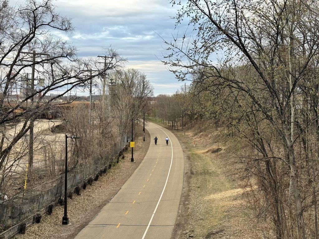 Midtown Greenway shown looking east from the Cedar Avenue bridge.