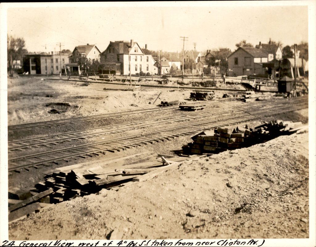 Three tracks at grade at 4th Ave before digging the trench and creating the yard.