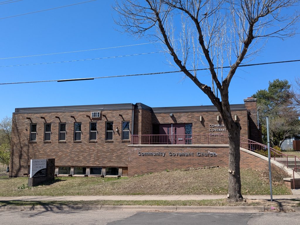 a brown brick flat-roofed building