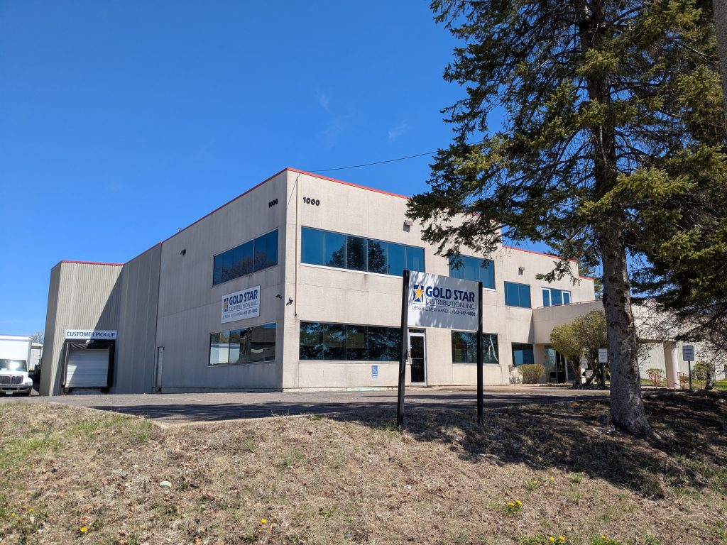 a bare concrete warehouse building