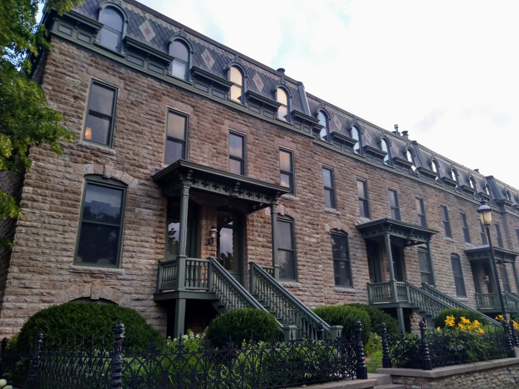 stone rowhouses with mansard roof