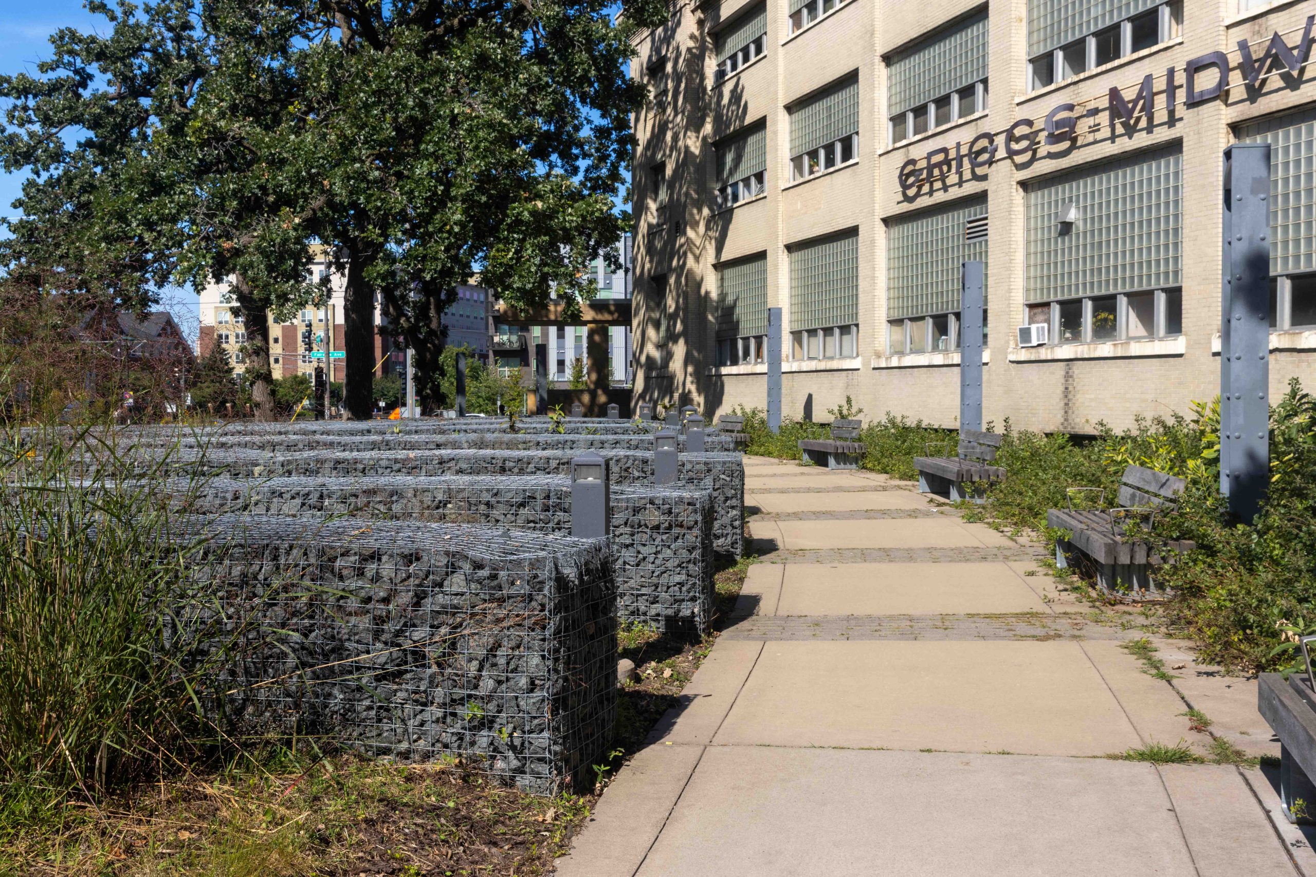 Gambions, curved sidewalk and benches; new features of Dickerman Park.
