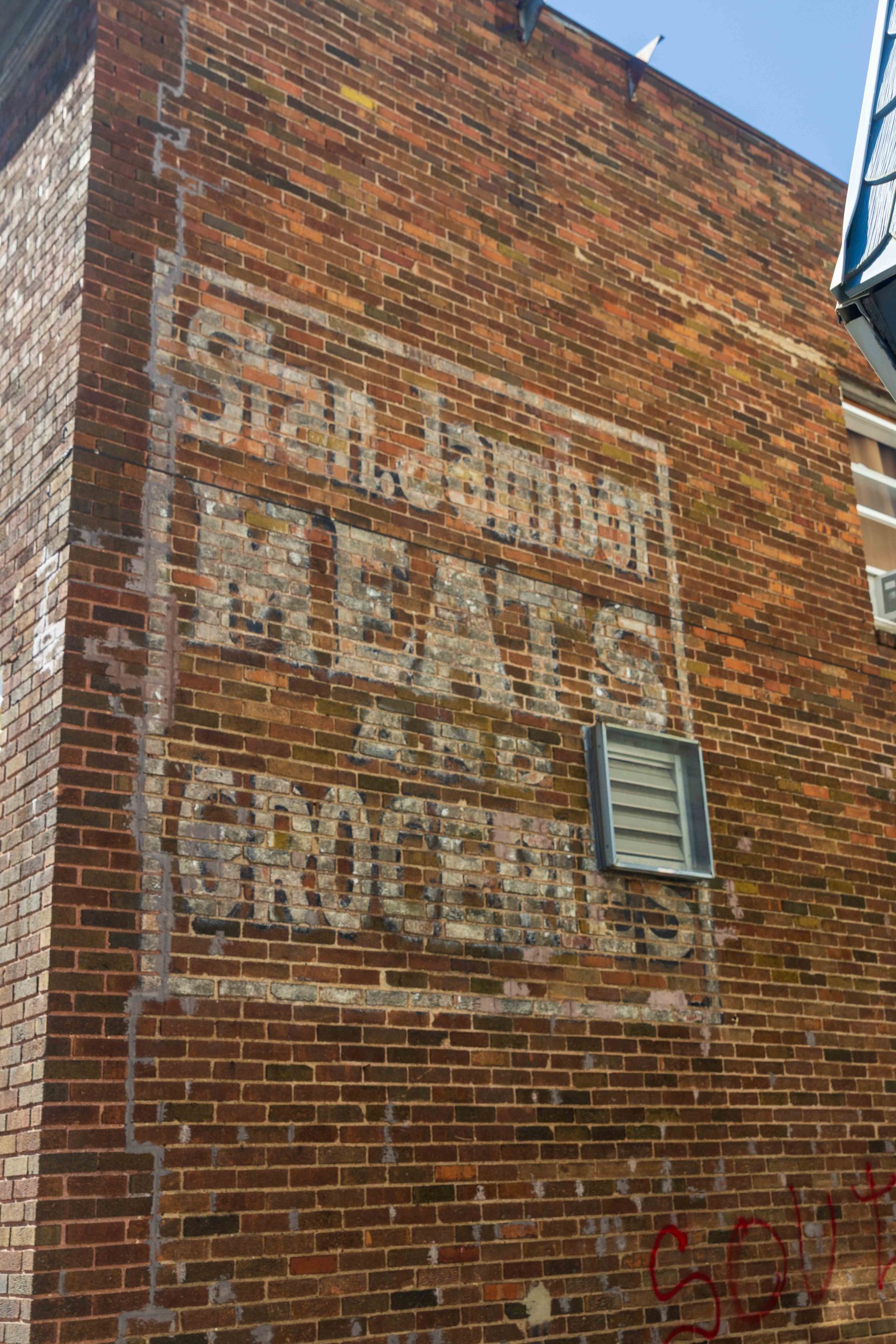 A sign for Stan Jambor’s meat market remains plainly visible on the north side of the building.