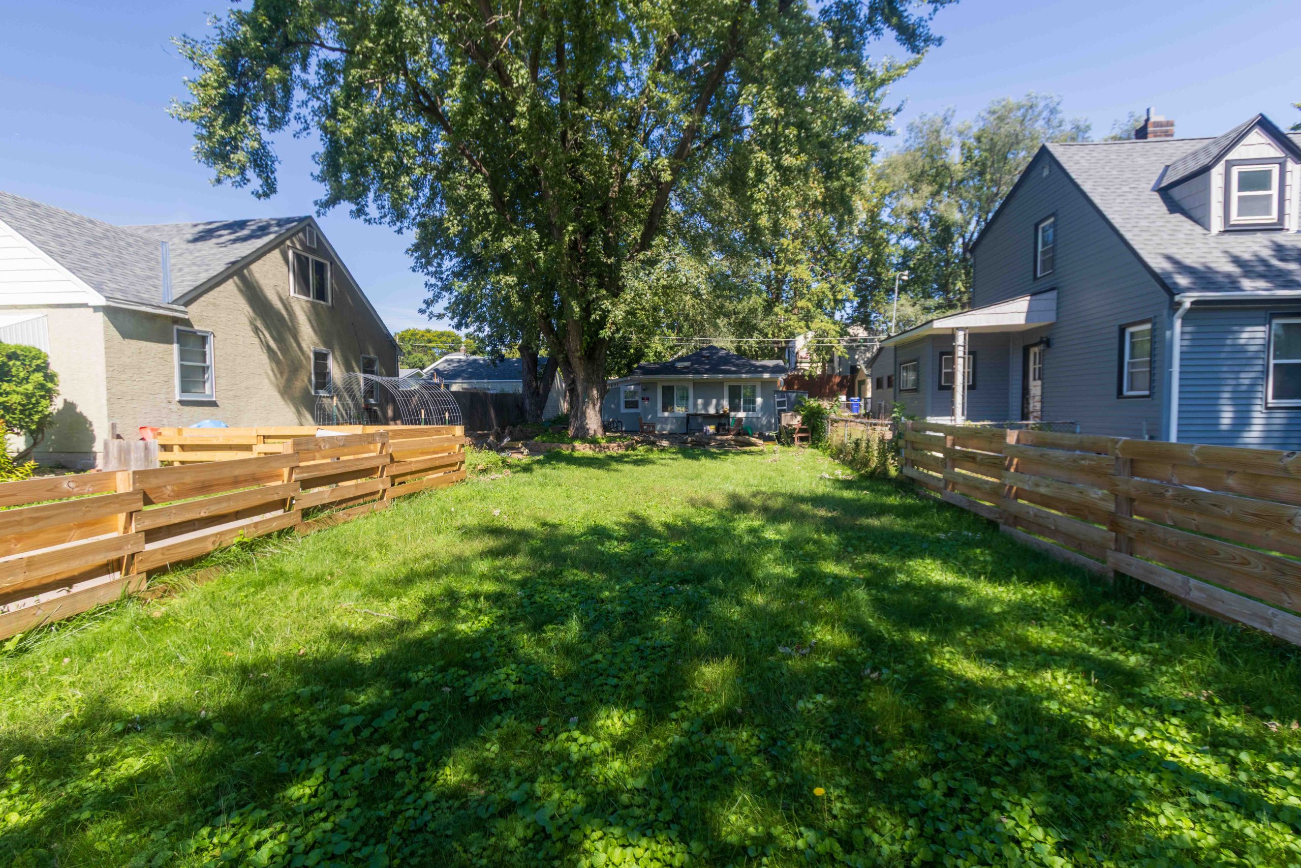 Small house at 1201 Magnolia Ave East is at the back of the lot.