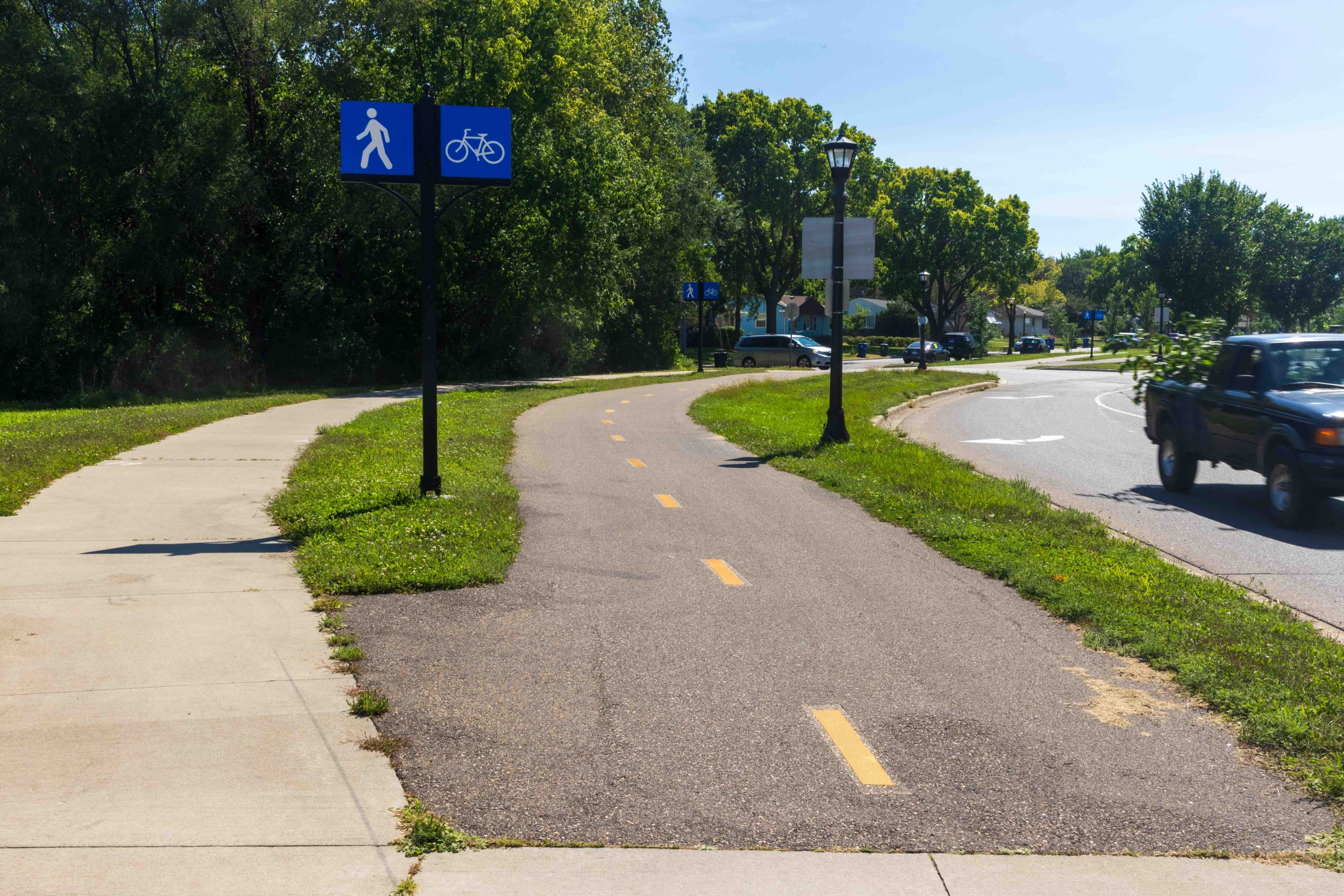 Bike path and sidewalk of Johnson Pkway.