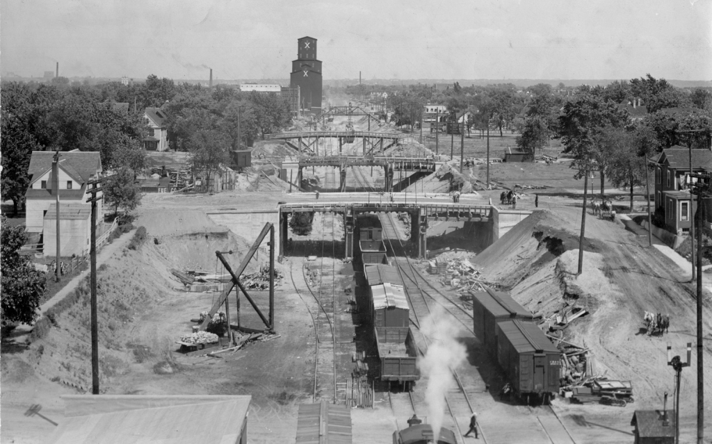 Looking east from Clinton Ave towards bridges under construction over the trench.