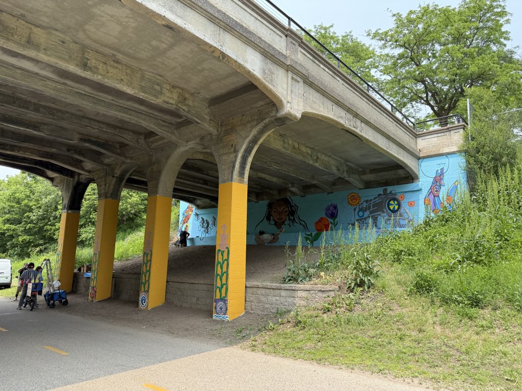 Mural painted under bridge at 15th Avenue.