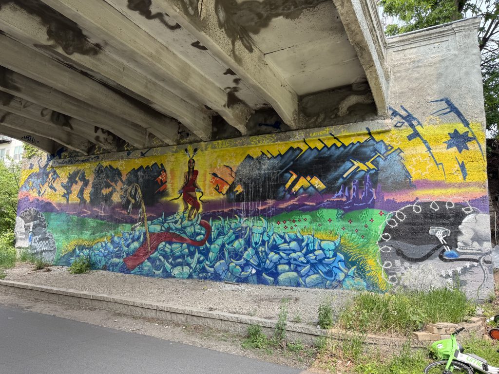 Mural painted under bridge at Aldrich Avenue.