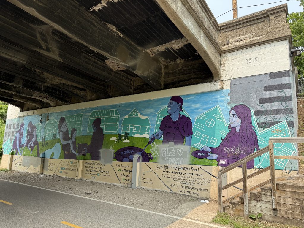 Mural painted under bridge at Columbus Avenue.