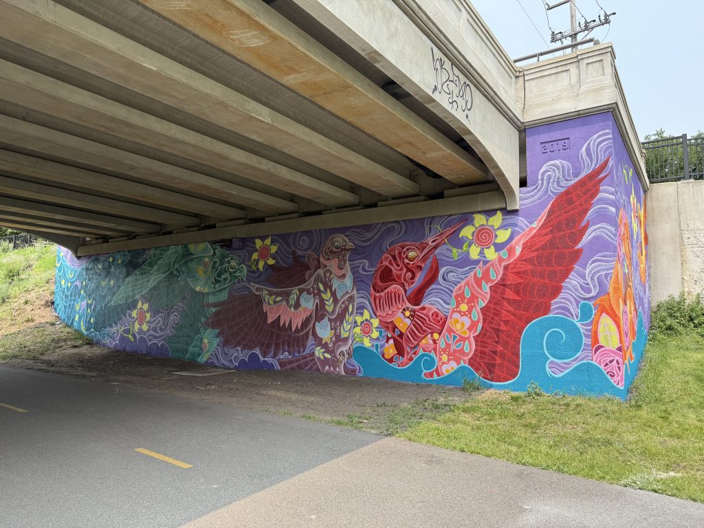 Mural painted under bridge at Fremont Avenue.