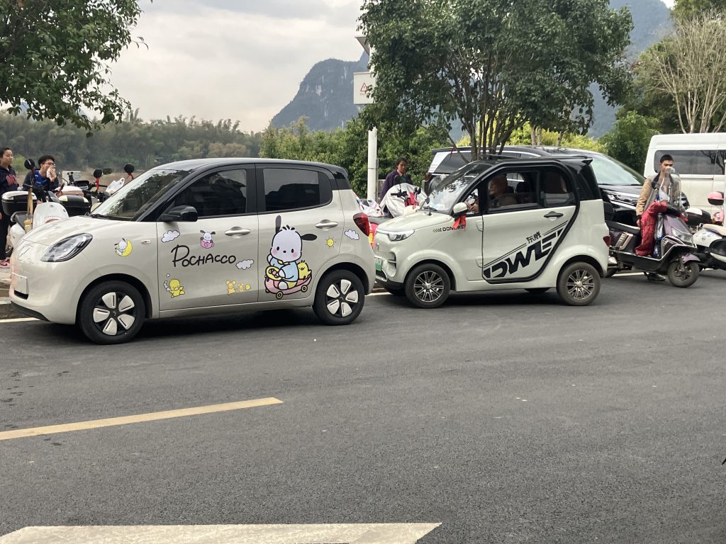 Two small compact electric cars