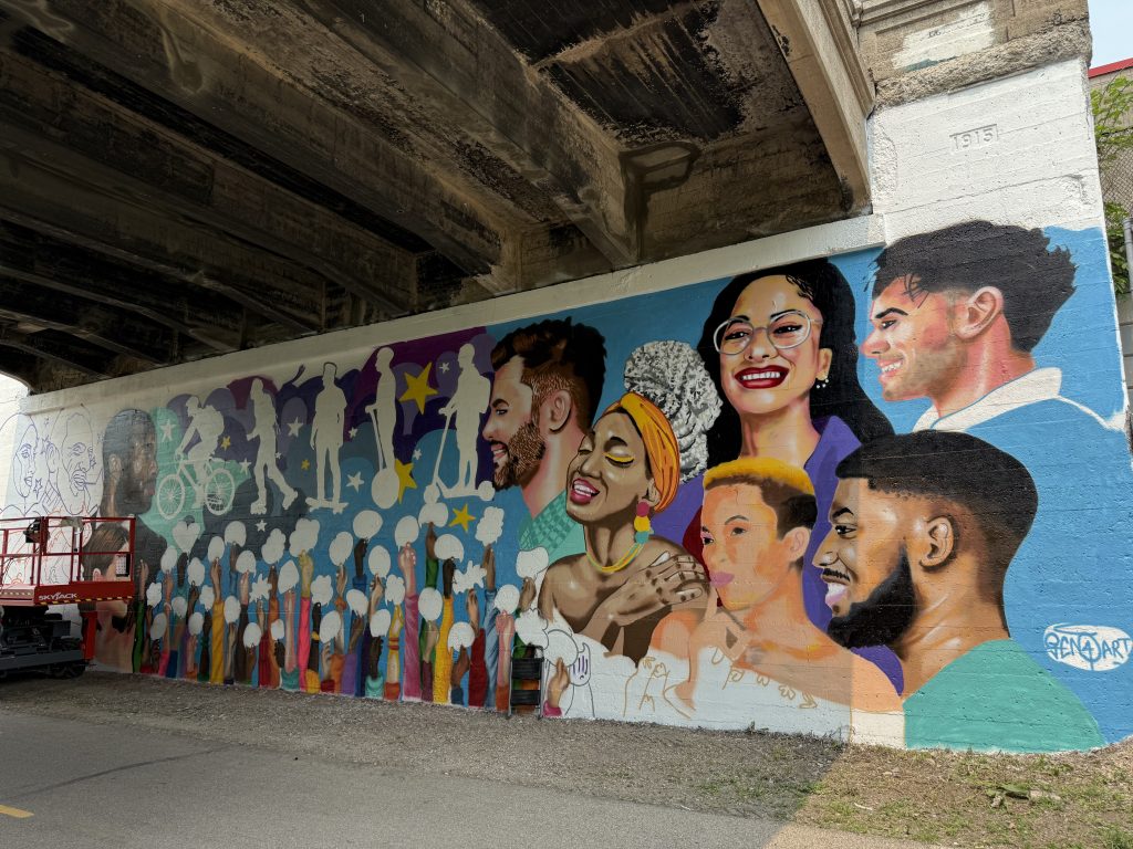 Mural painted under bridge at Oakland Avenue.