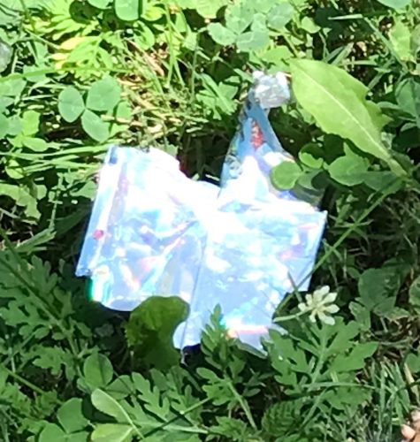 A plastic wrapper on grass
