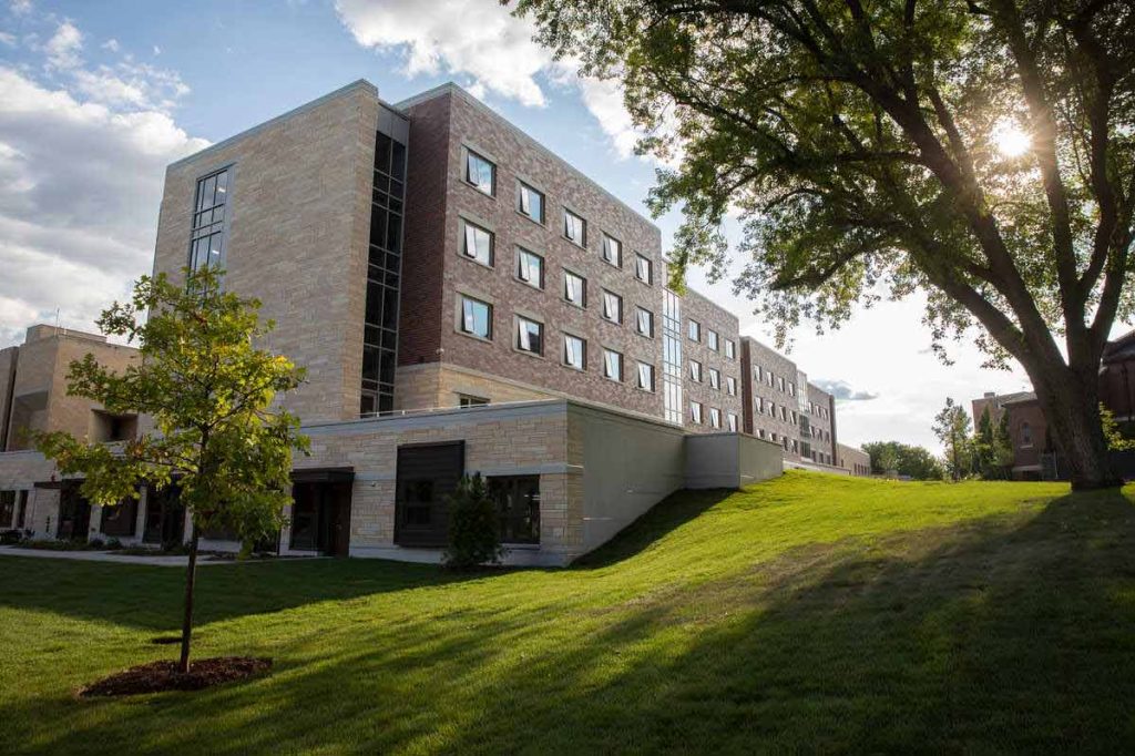 A residence hall seen from the bottom of a hill at the University of St. Thomas in St. Paul.