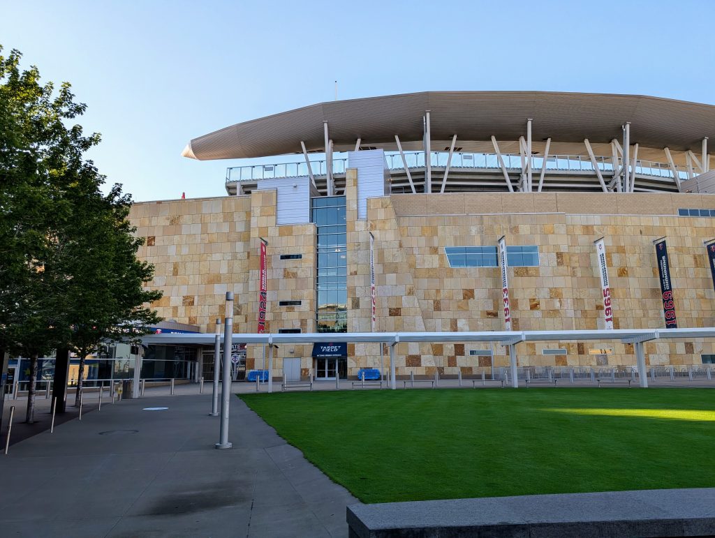 Target Field baseball stadium, featuring stone panels in various shades of brown and tan