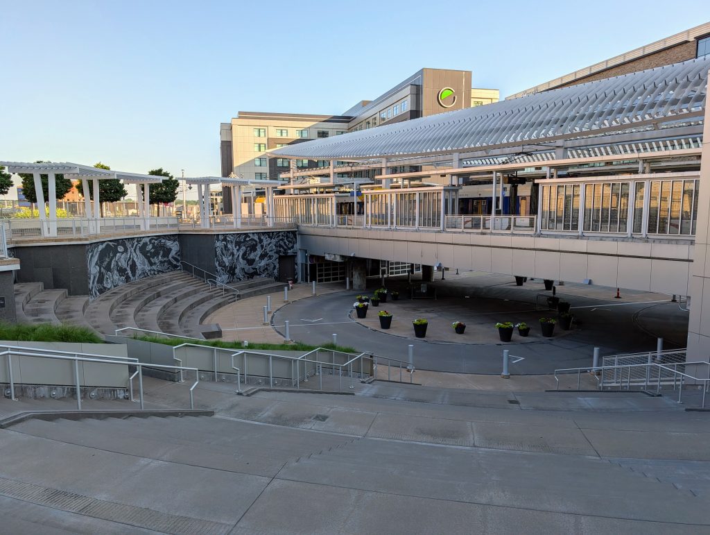 Metal and glass Target Field Station Platform 2 with semicircular plaza stairs leading to street level