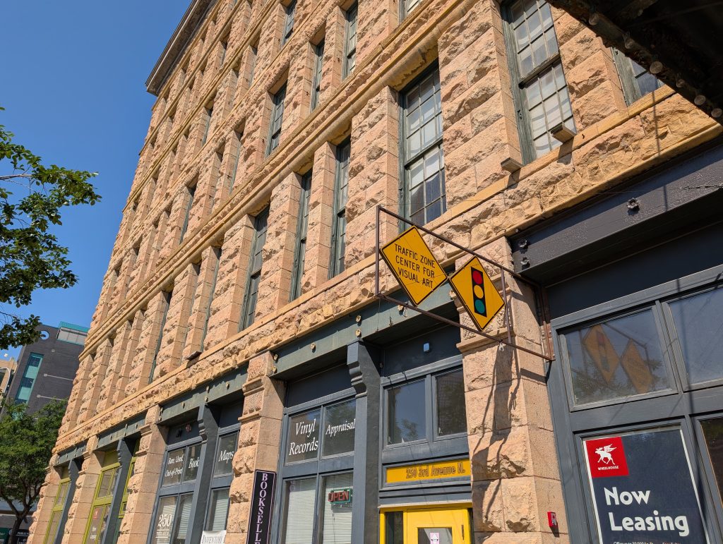 Limestone rock-faced buidling with main signage being for Traffic Zone Center for Visual Arts