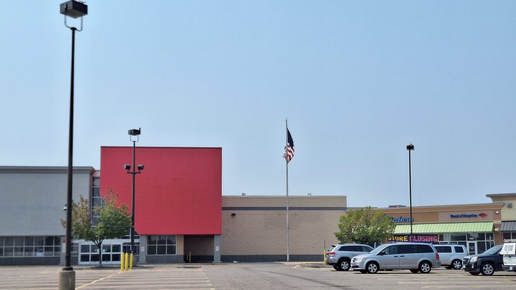 The store center that used to have a Cub is now empty. Nearby, Rainbow Shops displays a STORE CLOSING sign.