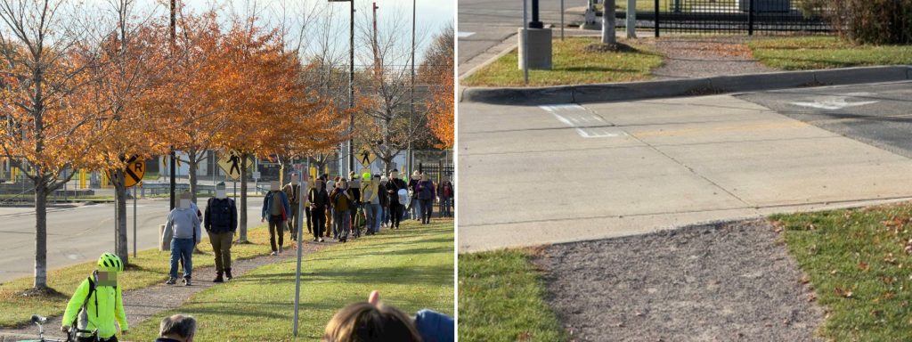 Demonstrators walking on a gravel sidewalk with signs and bikes. A close up photo of the steep curb.