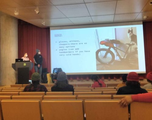 Presenters share a slide about how to keep your hands warm.