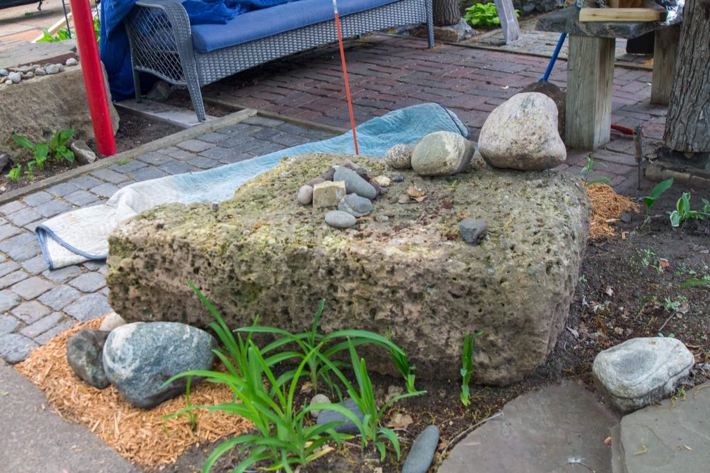 One of several large limestone blocks that were footings from the previous High Bridge in Doug's backyard.