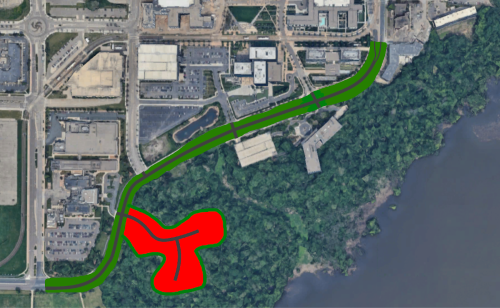 Satellite view of a section Old Shakopee Road (highlighted in green) with potential residential development highlighted in red.