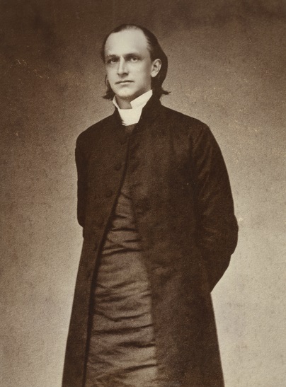 Black and white photography of Henry Benjamin Whipple from 1860. His is standing with this hands folded behind his back.