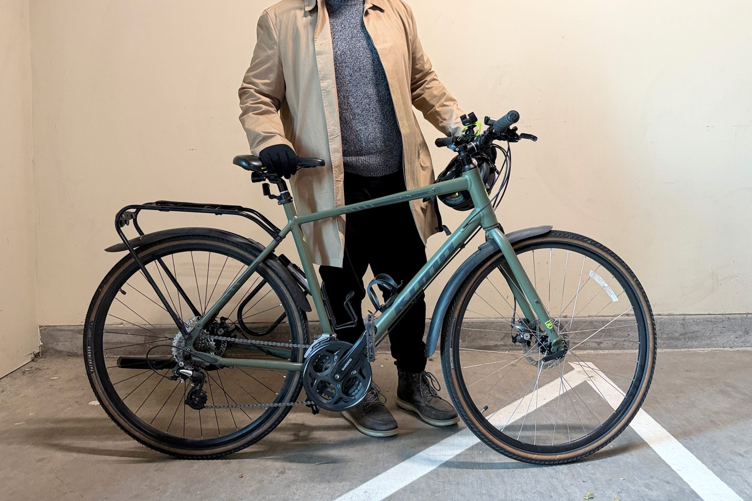 Derek shows off his commuting bicycle.