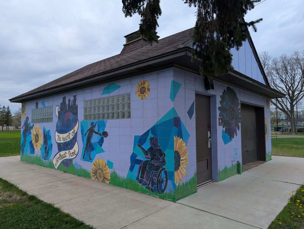 building with mural wrapping around it