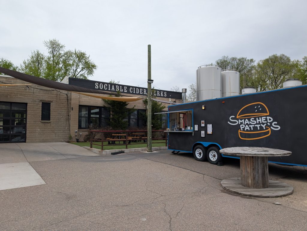 building with food trailer