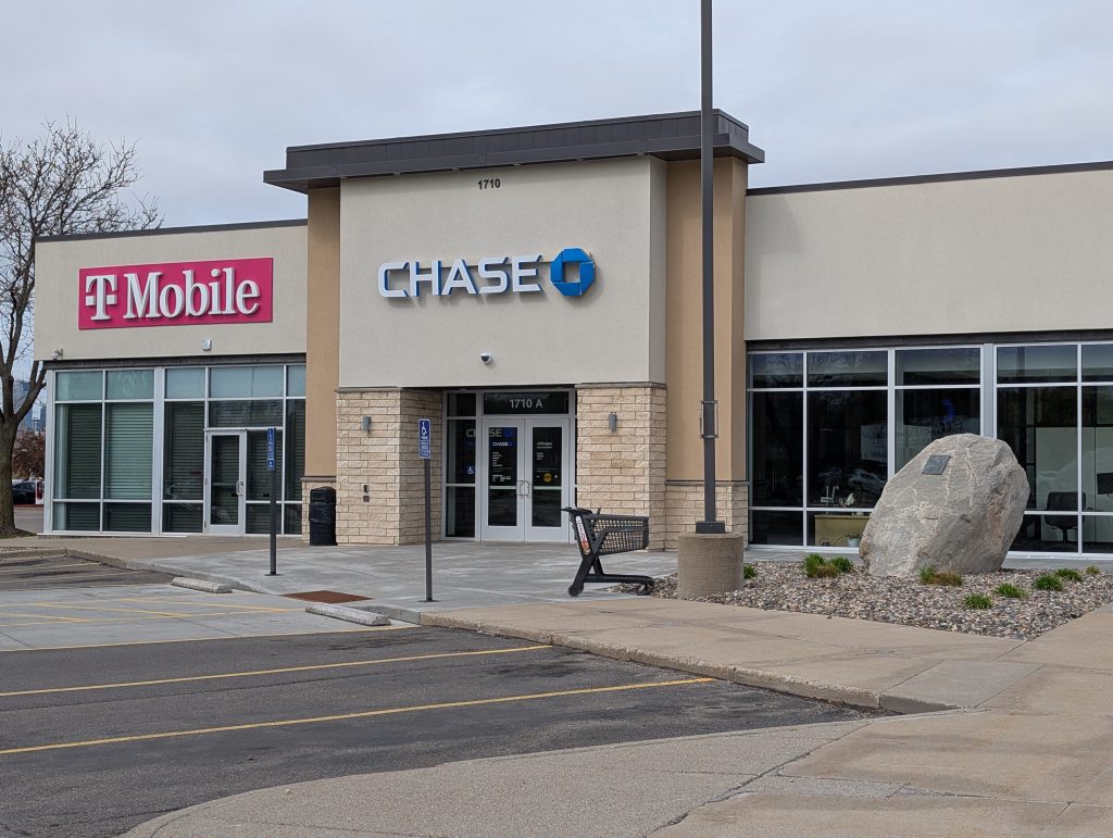 Retail building with boulder out front