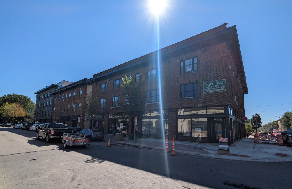 Three-story buildings at Dale Street and Selby Avenue, with multiple businesses inside.