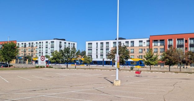 Target parking lot and Hamline Station Apartments, University Avenue, Saint Paul