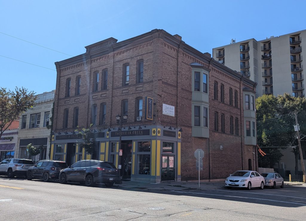 989 Payne Avenue, a three-story building with a restaurant in it.