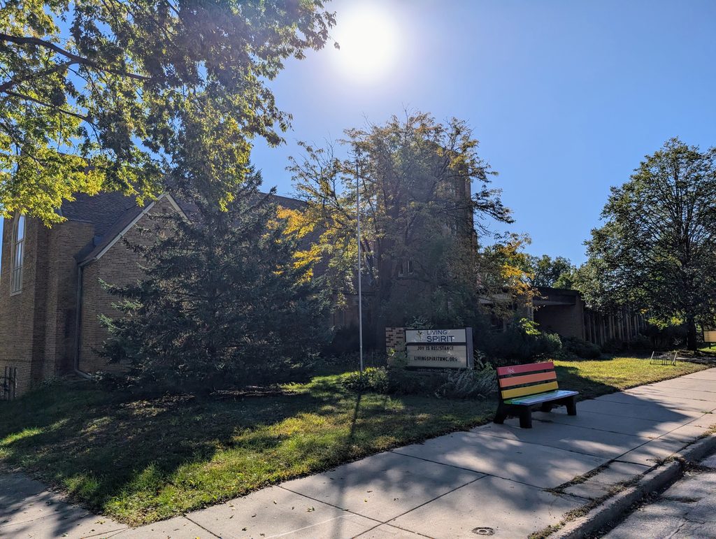 multicolored bench in front of church